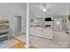 Spacious living room with vaulted ceilings, a fireplace, and neutral tones, creating a cozy atmosphere at 3419 Brickyard Ln, Midland, NC 28107