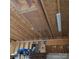View of access panel to attic above garage, along with ceiling and upper wall storage at 390 Robinson Rd, Mooresville, NC 28117