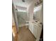 Bright bathroom with shower, updated vanity, and tile floor, offering a clean and modern design at 390 Robinson Rd, Mooresville, NC 28117