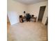This bedroom has neutral walls, a window, and carpet flooring, making it a cozy and inviting space at 390 Robinson Rd, Mooresville, NC 28117