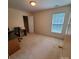 Bedroom with neutral carpet, desk and natural light from a window at 390 Robinson Rd, Mooresville, NC 28117