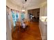 Cozy breakfast nook with a round wooden table, chairs, and natural light from surrounding windows at 390 Robinson Rd, Mooresville, NC 28117