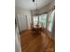 Charming breakfast area with hardwood floors, a round table, and large windows for ample sunlight at 390 Robinson Rd, Mooresville, NC 28117
