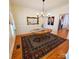 Warm and inviting dining room with hardwood floors, a wooden table, and stylish decor at 390 Robinson Rd, Mooresville, NC 28117