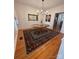 Elegant dining room with hardwood floors, wainscoting, and a stylish chandelier at 390 Robinson Rd, Mooresville, NC 28117