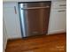 Modern kitchen with a stainless steel KitchenAid dishwasher and hardwood floors at 390 Robinson Rd, Mooresville, NC 28117