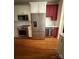 Kitchen area featuring a stainless steel refrigerator and other matching appliances at 390 Robinson Rd, Mooresville, NC 28117
