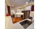 Modern kitchen featuring stainless steel appliances, shaker cabinets, and marble countertops at 390 Robinson Rd, Mooresville, NC 28117