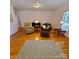 Bright living room with hardwood floors, comfortable seating, and natural light at 390 Robinson Rd, Mooresville, NC 28117