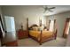 Comfortable bedroom with neutral carpet and windows, a ceiling fan, and dresser at 390 Robinson Rd, Mooresville, NC 28117