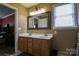Bathroom with a double sink vanity and large mirror, providing ample space and functionality at 400 Majolica Rd, Salisbury, NC 28147