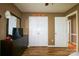 Bedroom with hardwood floors, television, and dresser, offering a comfortable and functional space at 400 Majolica Rd, Salisbury, NC 28147