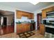 Functional kitchen with wooden cabinets and stainless steel appliances at 400 Majolica Rd, Salisbury, NC 28147