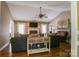 Cozy living room featuring a fireplace, vaulted ceiling and hardwood floors at 400 Majolica Rd, Salisbury, NC 28147