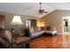 Comfortable living room featuring hardwood floors and a cozy sectional couch at 400 Majolica Rd, Salisbury, NC 28147