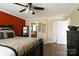 Cozy main bedroom with hardwood floors and ensuite bathroom access at 400 Majolica Rd, Salisbury, NC 28147