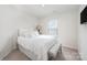 Bedroom with natural light, bench, tv and neutral carpeting at 4012 Woodsmill Rd, Fort Mill, SC 29707