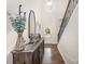 Bright entryway with hardwood floors, high ceilings, and a staircase with wrought iron railings at 4012 Woodsmill Rd, Fort Mill, SC 29707