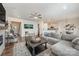 Spacious living room seamlessly connecting to the kitchen and dining area with hardwood floors at 4012 Woodsmill Rd, Fort Mill, SC 29707