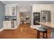 Open-concept kitchen with stainless appliances, custom cabinets, and an eat-in island at 4026 Sharon View Rd, Charlotte, NC 28226