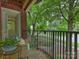 This balcony has an iron railing and features a wood deck, perfect for relaxing outdoors at 416 Queens Rd # 10, Charlotte, NC 28207