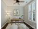 This home office features natural light, plantation shutters and modern decor at 416 Queens Rd # 10, Charlotte, NC 28207