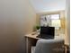 Cozy office space featuring a built-in desk, neutral decor, and ample natural light at 416 Queens Rd # 10, Charlotte, NC 28207