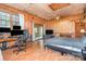 Bedroom with a desk setup, wood floors, a ceiling fan, and sliding glass doors at 417 Phifer Rd, Kings Mountain, NC 28086