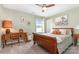 Inviting bedroom showcases a wooden sleigh bed, desk, and a window for natural light at 5092 Nighthawk Dr, Indian Land, SC 29707