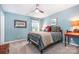 Cozy bedroom boasts a ceiling fan, carpet, and a comfortable bed with colorful pillows at 5092 Nighthawk Dr, Indian Land, SC 29707