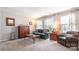 Cozy living room with ample seating, natural light, and tastefully selected furniture and decor at 5092 Nighthawk Dr, Indian Land, SC 29707