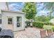 Paver patio with seating, a grill, and a view of the green backyard at 5092 Nighthawk Dr, Indian Land, SC 29707