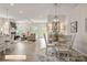 Open concept living area with hardwood flooring, fireplace, and plenty of seating at 523 Hullview Vis, Monroe, NC 28110