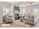 Cozy living room with a fireplace, neutral decor, and ample natural light at 523 Hullview Vis, Monroe, NC 28110