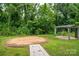 Landscaped backyard featuring a gazebo and serene setting at 535 Norman Fair Ave, Lincolnton, NC 28092