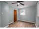 Cozy bedroom featuring wood-look floors, ceiling fan and fresh paint at 535 Norman Fair Ave, Lincolnton, NC 28092