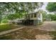 Back exterior view of the house featuring a small deck at 535 Norman Fair Ave, Lincolnton, NC 28092
