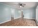Bright living room featuring modern ceiling fan, and laminate floors, bathed in natural light at 535 Norman Fair Ave, Lincolnton, NC 28092