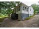 White, two-story home with partial basement and rear carport at 535 Norman Fair Ave, Lincolnton, NC 28092