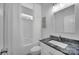 Stylish bathroom features a modern vanity, sleek fixtures, and a walk-in shower at 6004 Trailwater Rd, Charlotte, NC 28278