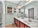 Bathroom features a dual-sink vanity with granite countertops at 6004 Trailwater Rd, Charlotte, NC 28278
