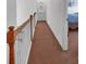 Hallway with carpet floors and access to the bedrooms at 6004 Trailwater Rd, Charlotte, NC 28278