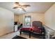Cozy bedroom with a ceiling fan, desk, and window with natural light at 6010 Old Pageland Marshville Rd, Marshville, NC 28103