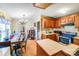 Functional eat-in kitchen area with ample wooden cabinets, countertop space, and appliances at 6010 Old Pageland Marshville Rd, Marshville, NC 28103