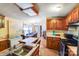 Bright eat-in kitchen and dining area with wood cabinets and an abundance of counter space at 6010 Old Pageland Marshville Rd, Marshville, NC 28103