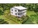 Aerial view of home showcasing its manicured grounds, trimmed hedges, and a classic architectural style at 704 Little Creek Dr, Kings Mountain, NC 28086