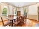 Spacious dining room features a large table, chandelier, and ample natural light at 704 Little Creek Dr, Kings Mountain, NC 28086