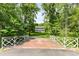 Stunning home featuring a brick bridge with scenic views leading to the picturesque estate at 704 Little Creek Dr, Kings Mountain, NC 28086