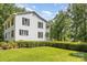 Charming two-story home featuring a spacious lawn, manicured hedges, and classic black shutters at 704 Little Creek Dr, Kings Mountain, NC 28086