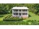 Classic two-story home with a welcoming exterior, manicured grounds, and a well-maintained lawn at 704 Little Creek Dr, Kings Mountain, NC 28086